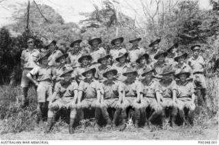 Group portrait of members of the 2/10 Field Ambulance detachment at Rabaul, New Guinea prior to the Japanese invasion. Identified in the back row, from left to right: VX26758 Private (Pte) George ..