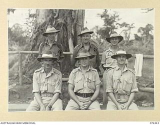 LAE, NEW GUINEA. 1944-10-01. OFFICERS OF THE 22ND WORKS COMPANY. IDENTIFIED PERSONNEL ARE:- NX38092 LIEUTENANT D.L.B. LUSK (1); VX104118 MAJOR R.C. UPSON (2); V148376 LIEUTENANT J.P. MCMULLAN (3); ..