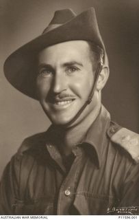 Studio portrait of QX35765 Lieutenant (Lt) Archibald Edward Charles Mullaly MC, 47th Battalion AIF.  In January 1945 Lt Mullaly was awarded the Military Cross for bravery at Mawaraka, Bougainville, ..