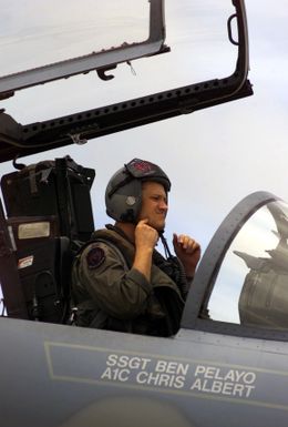 US Air Force (USAF) Captain (CAPT) Roper Worley, the 44th Fighter Squadron (FS), Kadena Air Force Base (AFB), Okinawa, Japan, removes his helmet after conducting a routine mission in his F-15 Eagle fighter