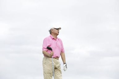 Barack Obama plays golf with Prime Minister Najib Razak, Joe Paulsen, and Mike Brush in Kaneohe Bay, Hawaii, December 24, 2014