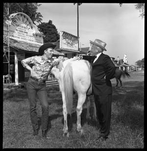 [Hank Williams and Bill Daniels by Horse's Rear]