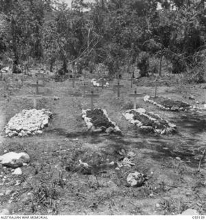 SCARLET BEACH, NEW GUINEA, 1943-10-25. VIEW OF PORTION OF THE WAR CEMETERY ON THE NORTHERN BANK OF THE QUOJA RIVER WHERE A NUMBER OF MEMBERS OF THE 2/3RD FIELD COMPANY, ROYAL AUSTRALIAN ENGINEERS ..