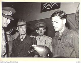 LAE AREA, NEW GUINEA, 1945-06-30. DURING HIS TOUR OF INSPECTION OF AUSTRALIAN TROOPS IN THE LAE AREA, HIS ROYAL HIGHNESS, THE DUKE OF GLOUCESTER, GOVERNOR-GENERAL OF AUSTRALIA (1) VISITED CORPS OF ..