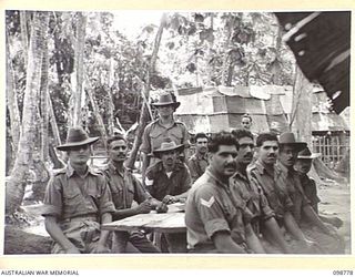 RABAUL, NEW BRITAIN. 1945-11-15. AN IDENTIFICATION PARADE OF SUSPECTED JAPANESE WAR CRIMINALS WAS ARRANGED BY THE WAR CRIMES COMMISSION, AT HEADQUARTERS 11 DIVISION. SHOWN, A GROUP OF INDIAN ARMY ..