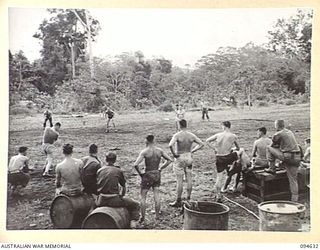 LAMARIEN, HENRY REID BAY, NEW BRITAIN, 1945-07-29. OFFICERS OF 2/2 COMMANDO SQUADRON PLAYING SOFTBALL AGAINST SERGEANTS OF THE SQUADRON AT THE CAMP OVAL