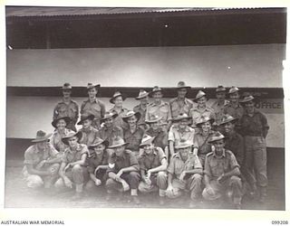 RABAUL, NEW BRITAIN, 1945-11-27. GROUP OF OTHER RANKS OF 5 BASE SUB AREA AT THEIR HEADQUARTERS IN MALAGUNA ROAD