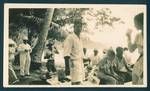 Group of people picnicking by the beach, New Guinea, c1929 to 1932