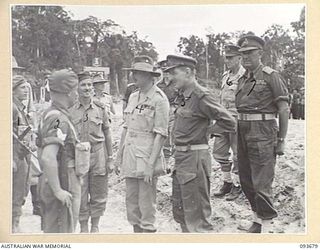 HONGORAI RIVER, BOUGAINVILLE, 1945-07-04. THE DUKE OF GLOUCESTER, GOVERNOR-GENERAL OF AUSTRALIA (4), TALKING TO TROOPS OF 24 INFANTRY BATTALION DURING HIS INSPECTION OF THE 3 DIVISION AREA. ..