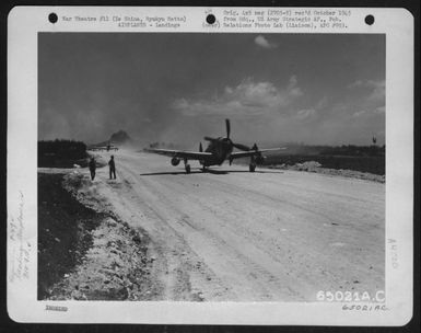 Republic P-47 'Thunderbolt' Of The 318Th Fighter Group Landing On Ie Shima, Ryukyu Retto After Long Flight From Former Base On Saipan, Marianas Islands. (U.S. Air Force Number 65021AC)