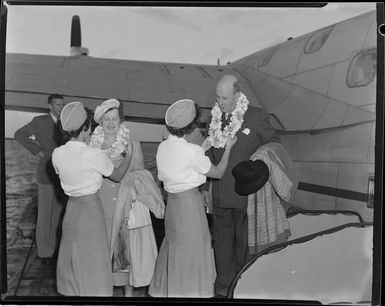 Hunts Travel Agency, passengers to Auckland, Mr and Mrs Doidge, with the air crew, Suva, Fiji