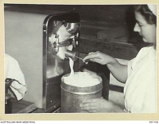 TOROKINA, BOUGAINVILLE. 1945-04-19. TFX14897 A.E. STREETS, MAKING ICE CREAM FOR THE RED CROSS SOCIETY TO SERVE TO PATIENTS IN 2/1 GENERAL HOSPITAL