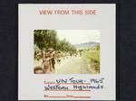 People walking on road, United Nations Visiting Mission, Western Highlands, [Papua New Guinea], 1965