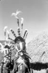 Portrait of men in elaborate costume and headdresses