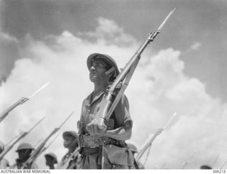 PAPUAN INFANTRY MAN. (NEGATIVE BY R. PEARSE)