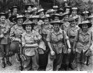 BRISBANE, QLD. 1945-02-21. AUSTRALIAN ARMY MEDICAL WOMEN'S SERVICE REINFORCEMENTS AT FRAZER'S PADDOCK BEFORE THEIR EMBARKATION TO THE 2/1 GENERAL HOSPITAL AT BOUGAINVILLE. (FOR IDENTIFICATION OF 17 ..