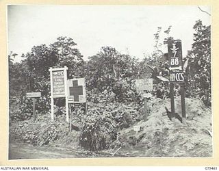 BOUGAINVILLE ISLAND. 1945-03-09. SIGNS ERECTED AT THE MAWARAKA ROAD JUNCTION ON THE MOSIGETTA ROAD IN THE AREA CONTROLLED BY HEADQUARTERS, 7TH INFANTRY BRIGADE