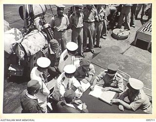 AT SEA OFF RABAUL, NEW BRITAIN. 1945-09-04. PRE- SURRENDER DISCUSSIONS ABOARD HMAS VENDETTA AT A SEA RENDEZVOUS OFF RABAUL BETWEEN REPRESENTATIVES OF LIEUTENANT GENERAL V.A.H. STURDEE, GENERAL ..