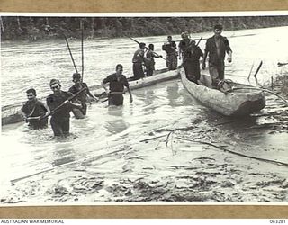 RAMU RIVER FAITA AREA, NEW GUINEA. 1944-01-07. MEMBERS OF A PATROL OF THE 2/2ND COMMANDO SQUADRON RETURNING FROM AN 8 DAY MARCH INTO JAPANESE HELD TERRITORY TOWARDS BOGADJIM. IDENTIFIED PERSONNEL ..