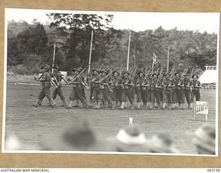 DONADABU, PAPUA, NEW GUINEA. 1944-01-01. THE PLATOON DRILL COMPETITION IN PROGRESS AT THE 15TH INFANTRY BRIGADE GYMKHANA