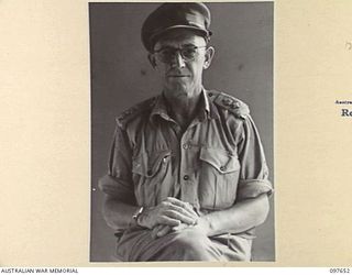 LAE, NEW GUINEA. 1945-10-04. LIEUTENANT COLONEL I.M. MACKERRAS, MALARIOLOGIST, HEADQUARTERS FIRST ARMY