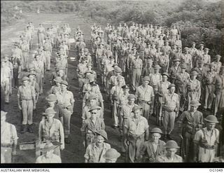 KIRIWINA, TROBRIAND ISLANDS, PAPUA. C. 1944-03. GROUP PORTRAIT OF AIRMEN OF NO. 30 (BEAUFIGHTER) SQUADRON RAAF ON COMMANDING OFFICER'S PARADE