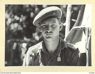 KAMANDRAN, NEW BRITAIN. 1945-02-19. VX4761 LIEUTENANT- COLONEL B.G DAWSON, COMMANDING OFFICER, B COMPANY 1ST NEW GUINEA INFANTRY BATTALION, WHO WAS WITH THE 2/22ND INFANTRY BATTALION IN 1942, BUT ..