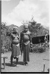 Pig festival, singsing, Kwiop: man and woman with feather headdresses and face paint