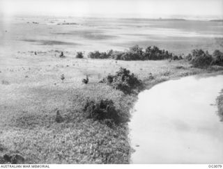 WEWAK AREA, NORTH EAST NEW GUINEA. C. 1945-06. IN ORDER TO RESCUE AN AMERICAN PILOT, LIEUTENANT (LT) J. P. CARTER, WHO HAD BALED OUT OF HIS LIGHTNING AIRCRAFT NEAR ENEMY-OCCUPIED TERRITORY, TWO ..