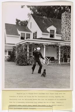 Photograph of Cesar Romero with his dog, Squeaky