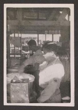 [Men Working in Kitchen]