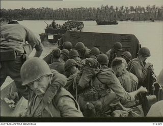 New Britain. December 1943. US soldiers aboard landing craft prepare for disembarkation as they approach the inhospitable shores near Arawe, where American troops forced a landing at dawn in one of ..