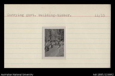 Carrying Govt. building timber