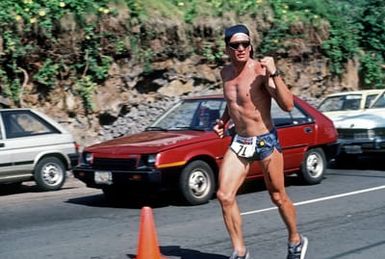 Major (MAJ) Gary Castelli, a member of the US Air Force, runs the 26-mile marathon, part of the 1987 Ironman Competition