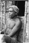 Portrait of Maenaa'adi sitting by door