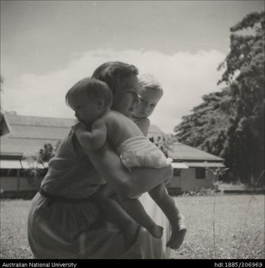 Woman holding children