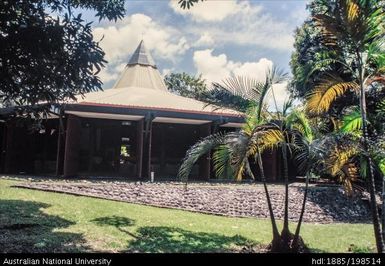 Fiji - white building with pointed roof, blue cap