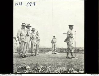 Port Moresby, Papua. 1944-08-05. Major General B. M. Morris DSO, Commander of the Australian - New Guinea Administrative Unit (ANGAU), making a speech at the opening of the Bomana War Cemetery
