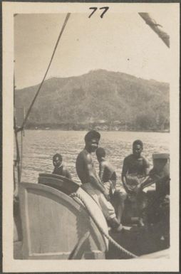 Papuan men on a schooner, New Britain Island, Papua New Guinea, approximately 1916