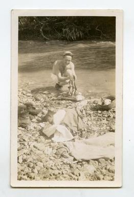 [Photograph of Soldier Washing Clothes]