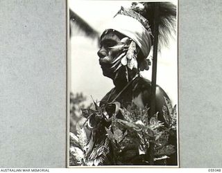 HOPOI DISTRICT, NEW GUINEA, 1943-10-30. A VILLAGE ELDER DRESSED UP FOR A DANCE WHICH WAS HELD AFTER THE CONFERENCE OF NATIVE CHIEFS WITH NX155085 CAPTAIN R.G. ORMSBY OF THE AUSTRALIAN AND NEW ..