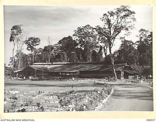 LAE, NEW GUINEA. 1945-10-22. THE OFFICERS' CLUB AT HEADQUARTERS AUSTRALIAN ARMY CANTEENS SERVICE