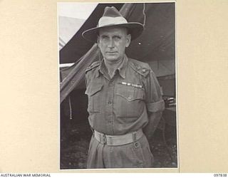 CAPE WOM, WEWAK AREA, NEW GUINEA. 1945-10-13. LIEUTENANT COLONEL C.R. THOMSON, ASSISTANT DIRECTOR OF ORDNANCE SERVICE, 6 DIVISION