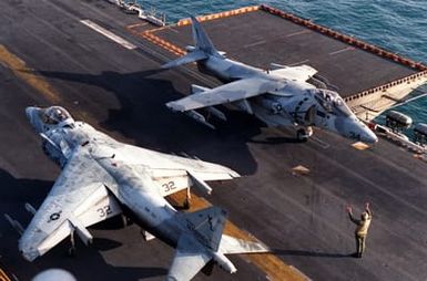 AB-8B Harrier aircraft of Marine Heavy Helicopter Squadron 362 (HMH-362) are positioned on the flight deck of the amphibious assault ship USS SAIPAN (LHA-2) as the vessel is underway in support of maritime interdiction operations