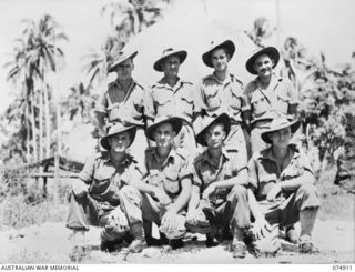 SOUTH ALEXISHAFEN, NEW GUINEA. 1944-07-24. SIGNALS PERSONNEL OF THE 2/14TH FIELD REGIMENT. IDENTIFIED PERSONNEL ARE:- VX29072 GUNNER A.H. STANDING (1); VVX18876 BOMBARDIER A.G. BADENHOP (2); ..