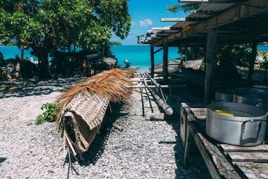 Boatshed with covered canoe, Atafu, Tokelau