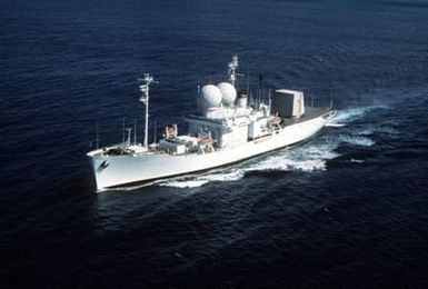 An aerial port bow view of the missile range instrumentation ship USNS OBSERVATION ISLAND (T-AGM 23) underway off the coast Hawaii
