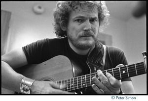 Gordon Lightfoot: half-length portrait, playing guitar