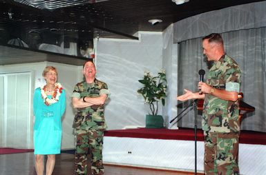 General Charles C. Krulak, 31st Commandant of the Marine Corps, and his wife, Zandi, receive compliments from Marine Forces Pacific Commanding General, Lieutenant General Carlton Fulford at the Officers' Club at Kaneohe Bay, Marine Corps Base Hawaii. This is the commandant's farewell tour to Marine Forces Pacific before his retirement