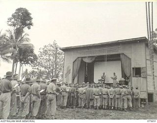 LAE, NEW GUINEA. 1944-09-03. PERSONNEL OF HEADQUARTERS, NEW GUINEA FORCE ATTENDING A SERVICE TO COMMEMORATE THE 5TH ANNIVERSARY OF THE OUTBREAK OF WAR CONDUCTED BY NX156703 CHAPLAIN R.S. PICKUP, ..